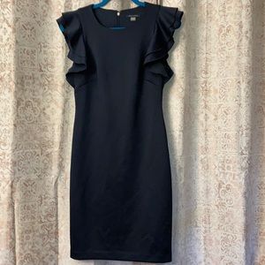 Women’s size 4 Tommy Hilfiger scuba neck dress with ruffled cap sleeves in navy.